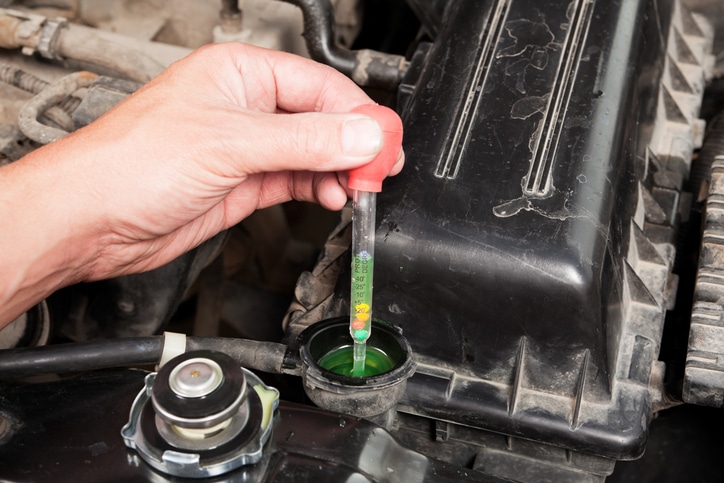 Mechanic Testing Vehicle Radiator Antifreeze Protection Level