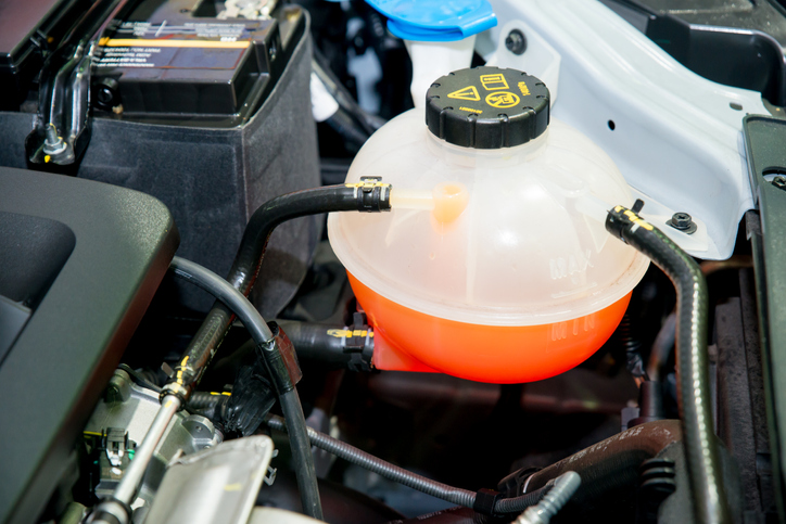 Close up Coolant container in a car's engine bay
