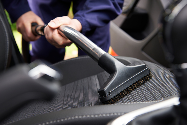 cleaning a car seat using hoover