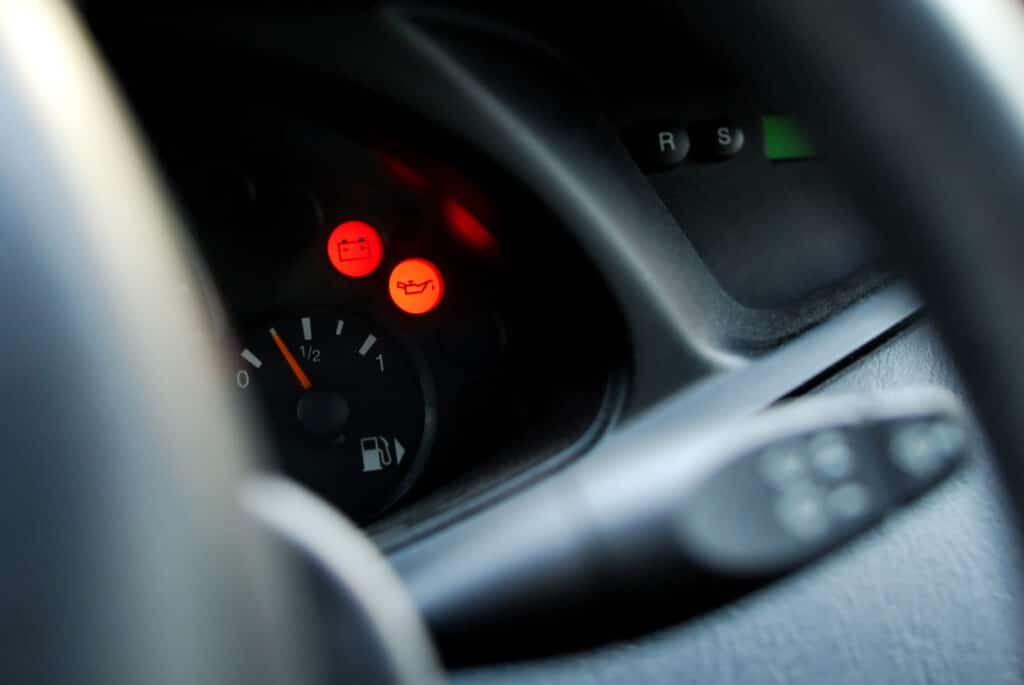 Closeup of car dashboard, with red light controls