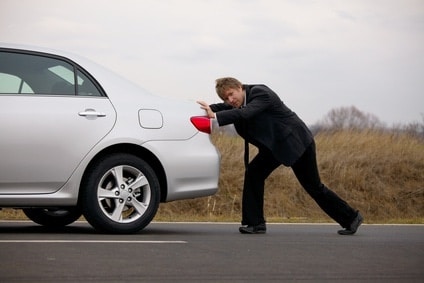 Pushing a broken down car