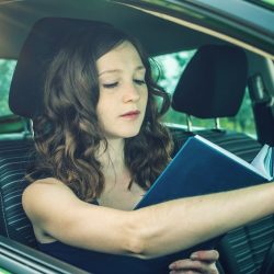 women reading car glossary