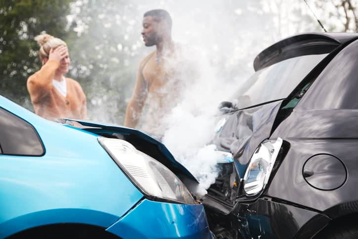 travel sickness causes Two Angry Motorists Arguing Over Responsibility For Car Accident