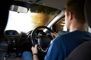 guy driving car