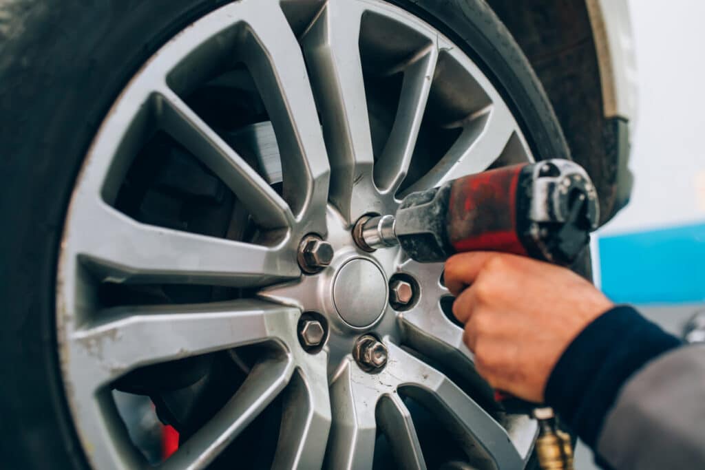 Mechanic changing a tyre