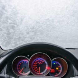 View of ice from inside of car on windscreen
