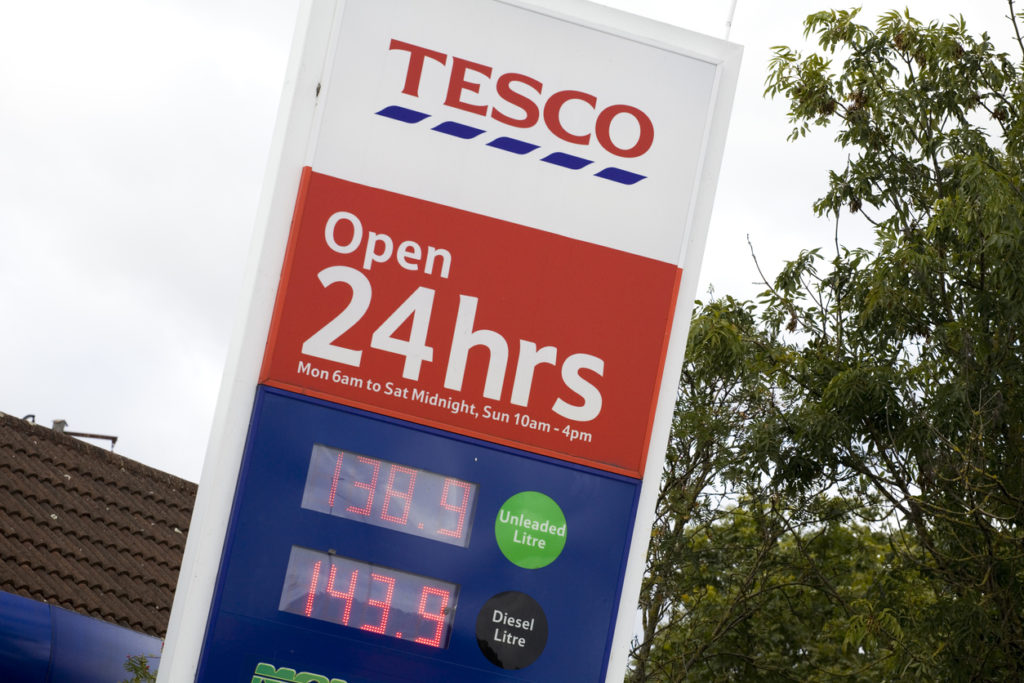 Tesco Supermarket Petrol Station Sign. Showing 24 Hours a day opening from Monday to Saturday. Petrol and Diesel priced in pounds per litre