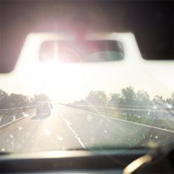 Dangerous sun dazzle - dirty windscreen with glare