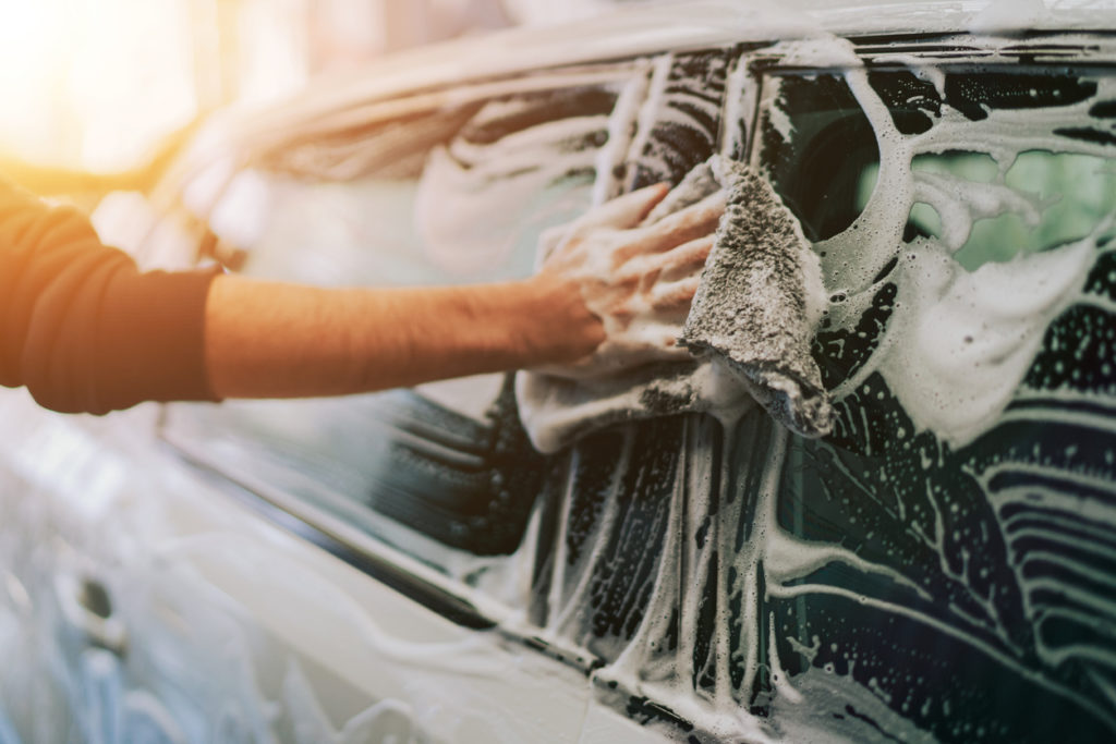 washing car using shampoo