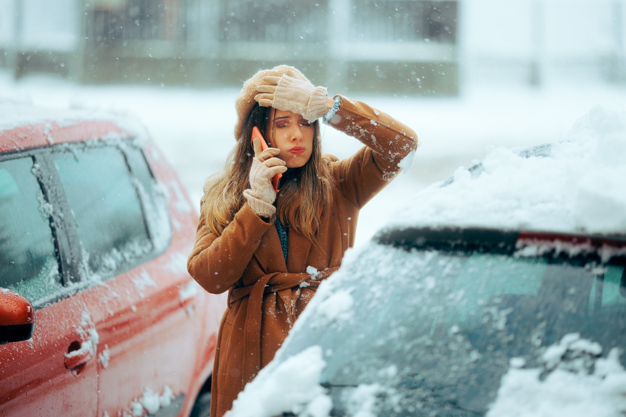 Woman Stuck in the Snow with Broken Car Calls the Service