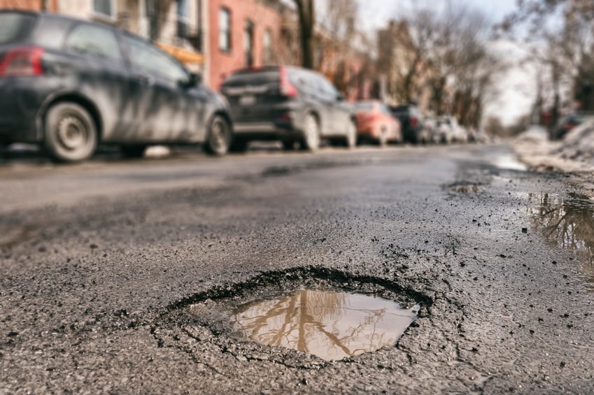Big pothole in the road