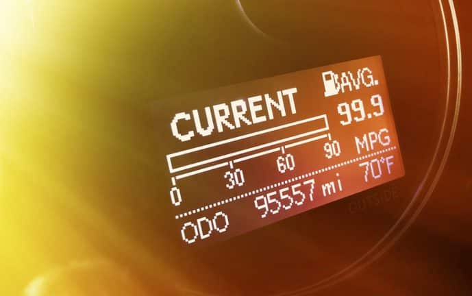 A close up of a dashboard in a hybrid car.