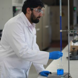 Holts Employee Working in the Lab