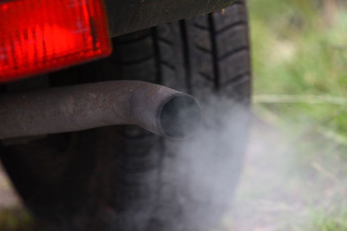 Car exhaust pollution from pipe